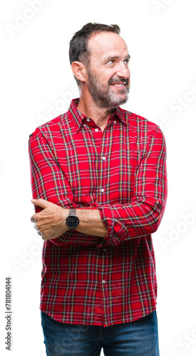 Middle age hoary senior man over isolated background looking away to side with smile on face, natural expression. Laughing confident.