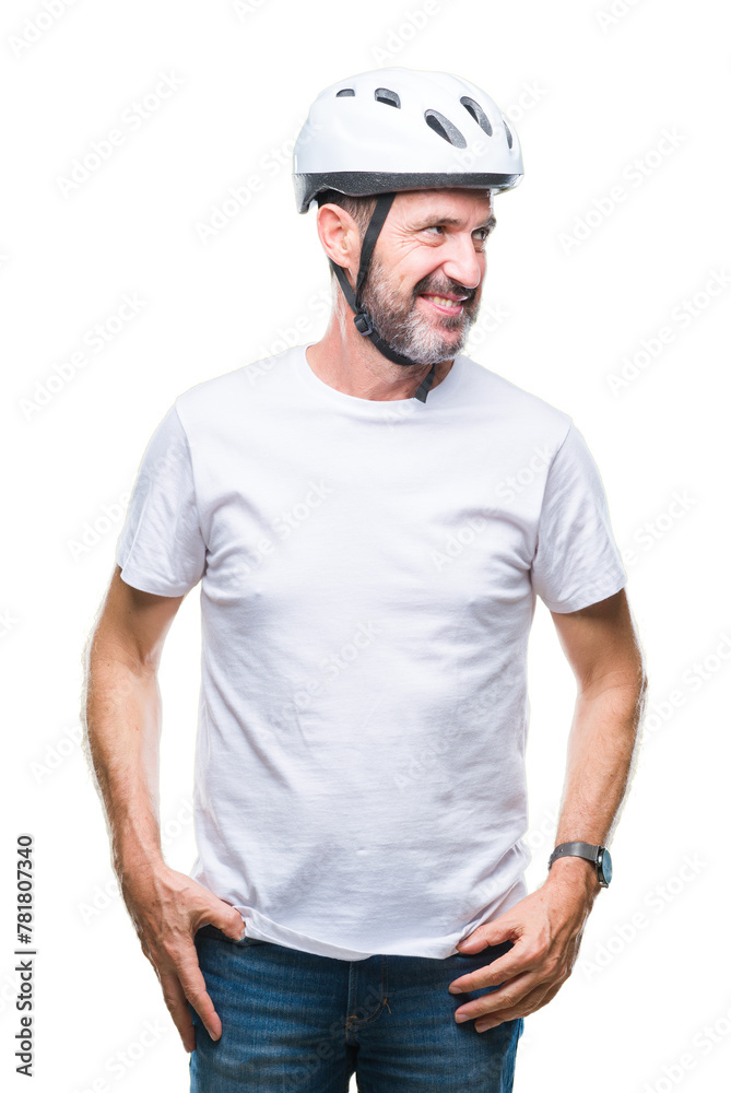 Middle age senior hoary cyclist man wearing bike safety helment isolated background looking away to side with smile on face, natural expression. Laughing confident.