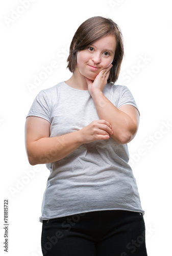 Young adult woman with down syndrome over isolated background thinking looking tired and bored with depression problems with crossed arms. © Krakenimages.com