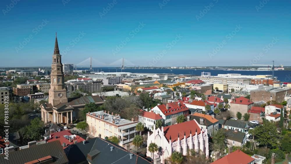a moving drone shot of the skyline in downtown Charleston south Carolina with the Ravenel bridge visible. a moving drone shot of the skyline in downtown Charleston south Carolina with the Ravenel bridge visible.