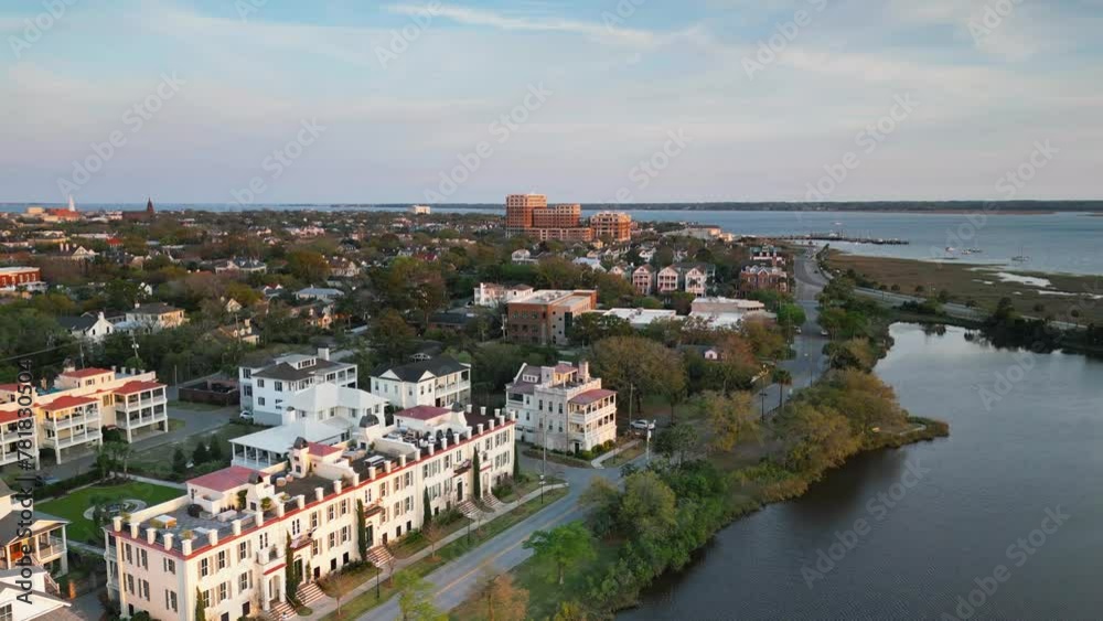 A drone shot showing waterfront property in downtown charleston south carolina. A drone shot showing waterfront property in downtown charleston south carolina.
