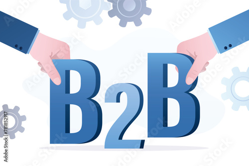 Businessmen hands holds giant letters, b2b concept. Successful negotiations, collaboration, corporate relations. Business vision, cooperation or interaction of entrepreneurs.