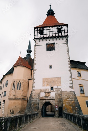 The main entrance to Blatna Castle on a cloudy spring day photo