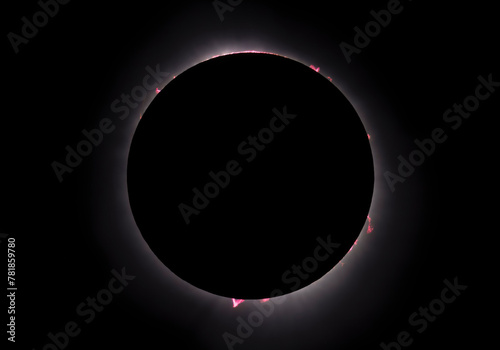 Composite early and late totality photograph displays the prominences, filaments, and flares as the moon blocked the sun during the April, 2024 total solar eclipse.