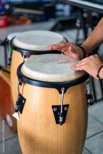Harmony of the Tombas: Close-Up of Hands Playing Percussion