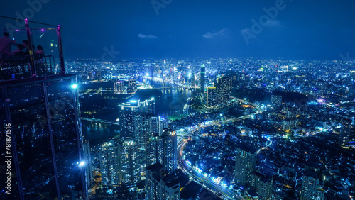 Wallpaper Mural view of the Saigon Ho Chi Minh city at night, blue color traffic road lights and urban connection Torontodigital.ca