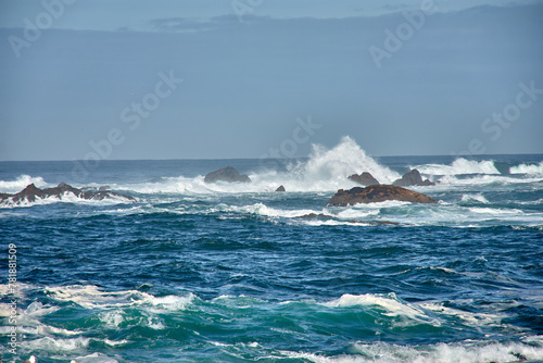 Large waves breaking at the Baiona Breakwater, Pontevedra, Spain