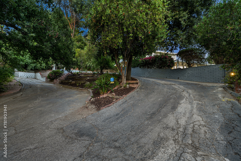 Remodeled Los Angeles home with a vacant concrete driveway
