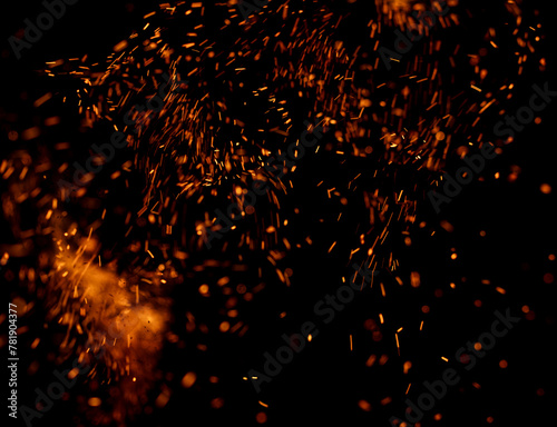 fire flame with sparks on black background. © studybos