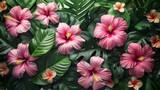 Tropical green leaves and pink bloom flowers for beautiful background.
