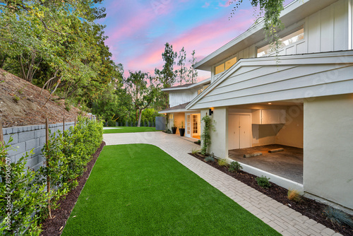 Remodeled Los Angeles home yard with lush trees