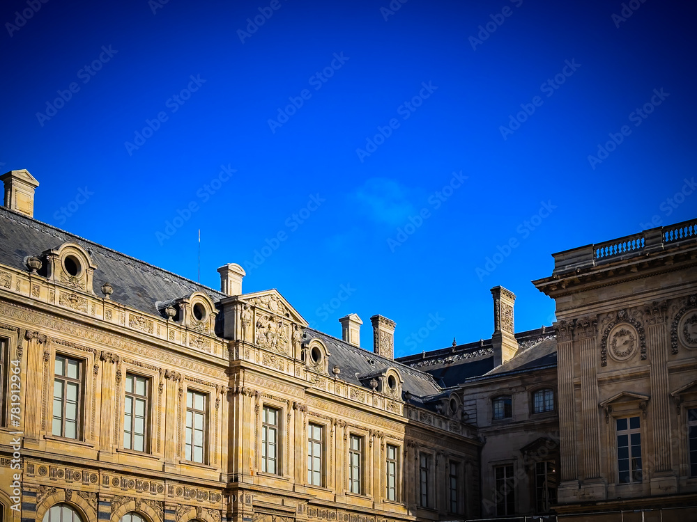 Antique building view in Paris city, France. 