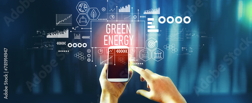 Green Energy concept with person using a smartphone