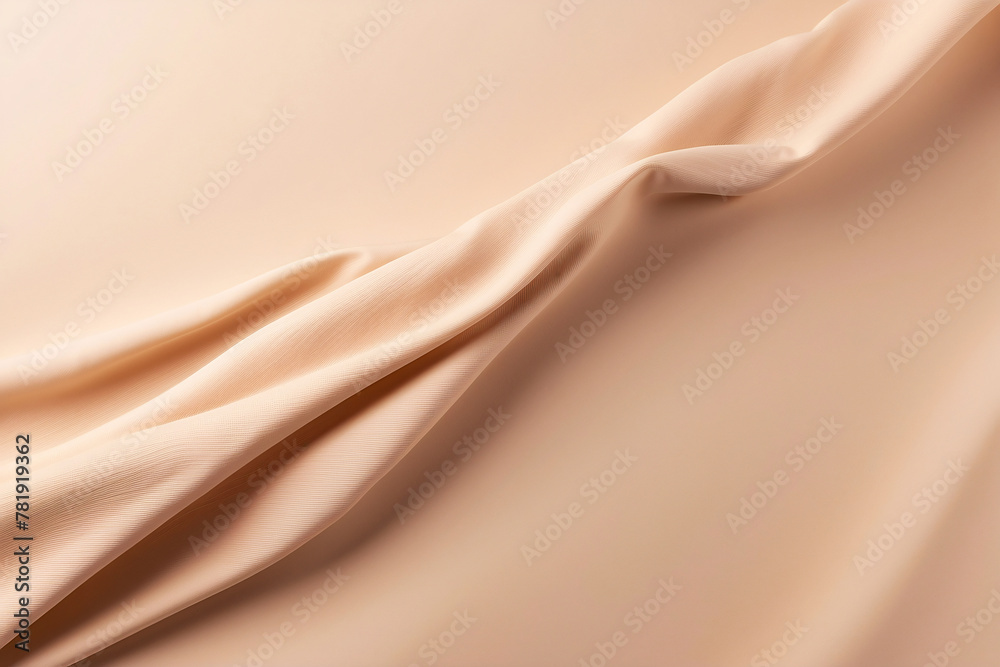 Fototapeta premium The image shows a close-up of smooth satin fabric creating a luxurious and sophisticated texture in soft neutral tones