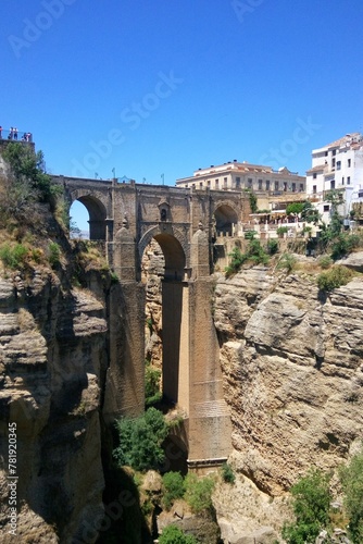 Puente Nuevo arch bridge over the tajo Gorge at Ronda village, Spain. Tourist viewpoint cliff in Ronda province of Malaga, Andalucia