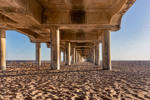 Entire Length of Underside of Huntington Beach Pier from Low Perspective with Blue Sky Behind, California, USA, horizontal-no people photo