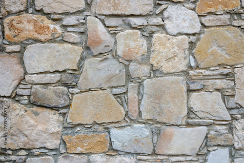 Old weathered  limestone brick wall texture background