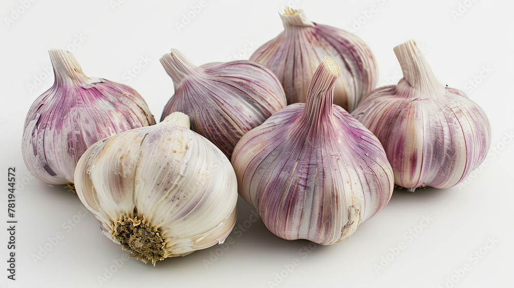 Obraz premium Flat lay of harvested garlic on white background