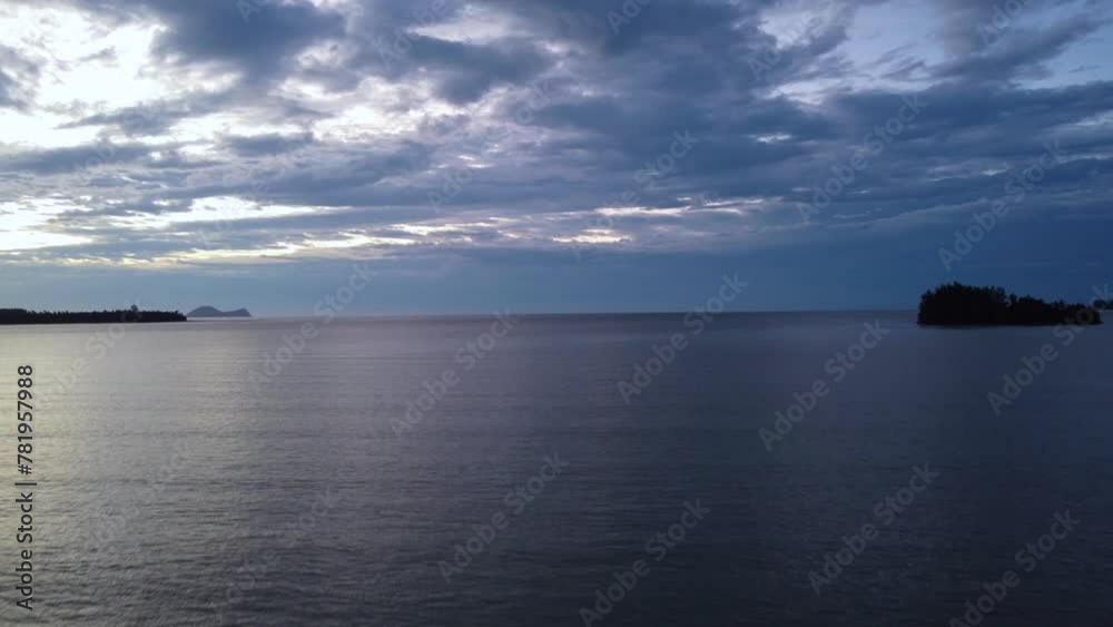 Aerial time lapse video of a beautiful sunset at Pasir Pandak beach, Santubong Sarawak, Malaysia Aerial time lapse video of a beautiful sunset at Pasir Pandak beach, Santubong Sarawak, Malaysia