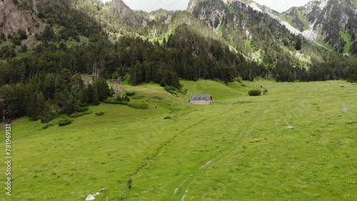 Aerial Drone Footage Pyrenees
 mountains in a sunny day.  Praderas de Colomers. Val d'Aran, Lleida, Spain.
