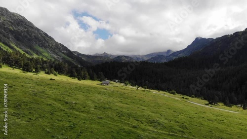 Aerial Drone Footage Pyrenees
 mountains in a sunny day.  Praderas de Colomers. Val d'Aran, Lleida, Spain.