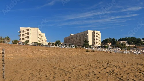 Beach and hotel of Eloro in Noto, Sicily, Italy on a sunny day photo