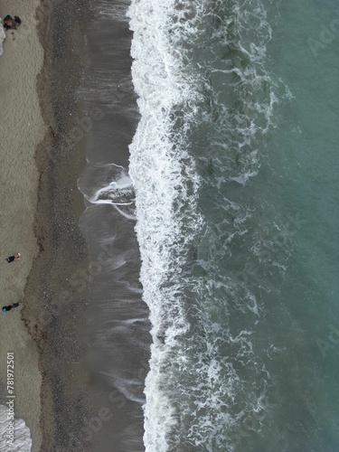 Vertical shot of a wavy sea