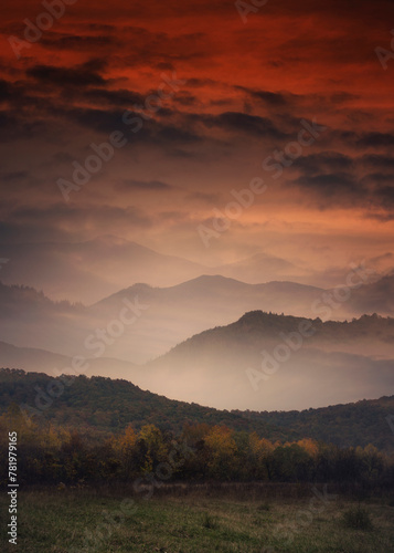 sunset sky and mountains in fog, fantasy landscape