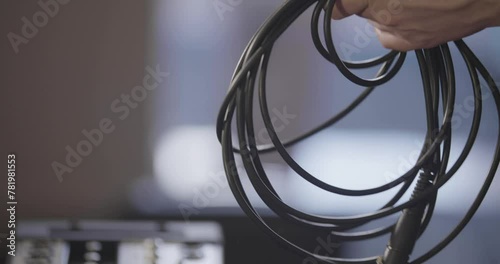 Closeup of wires of audio tech equipment during setting up photo