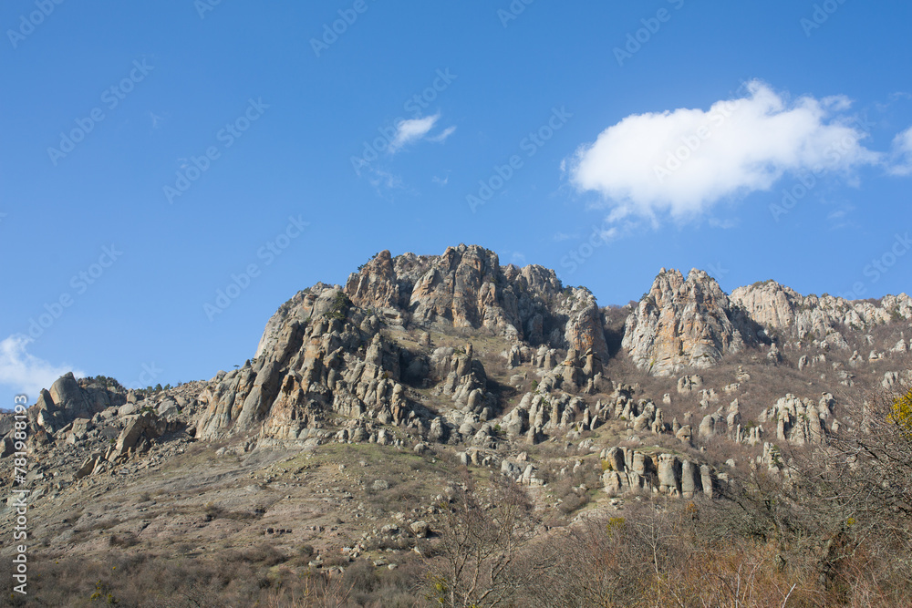 Mountains in spring Crimea against a background of blue sky and bright sunlight