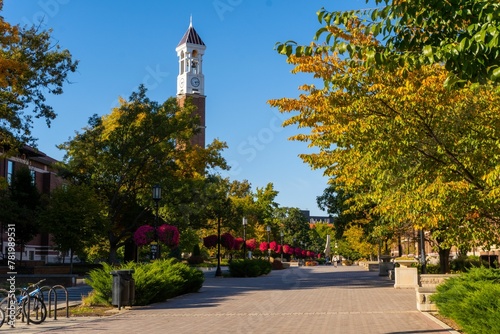 Bell tower surrounded by colorful autumn trees in West Lafayette Campus, Indiana photo