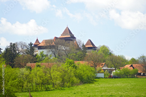 View of the fortified church in the village of Viscri - a landmark of Romania, listed as a UNESCO World Heritage Site