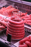 Raw meat for sale in a butcher shop..