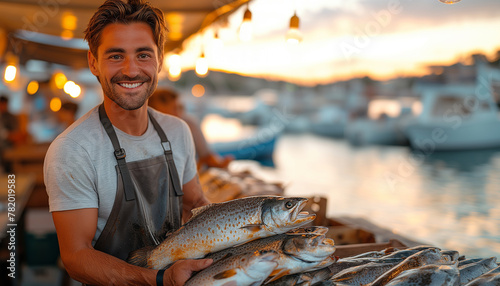 Young fishmonger with fresh catch fish market. Healthy seafood concept for design and lifestyle photo