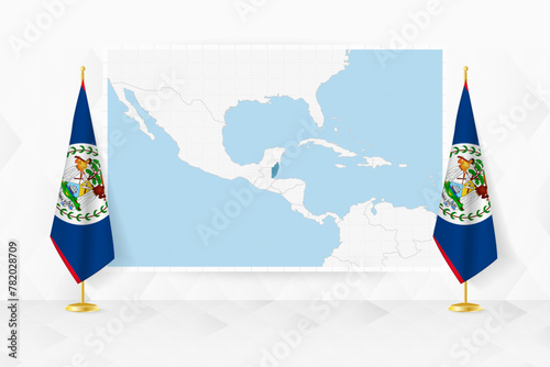 Map of Belize and flags of Belize on flag stand.