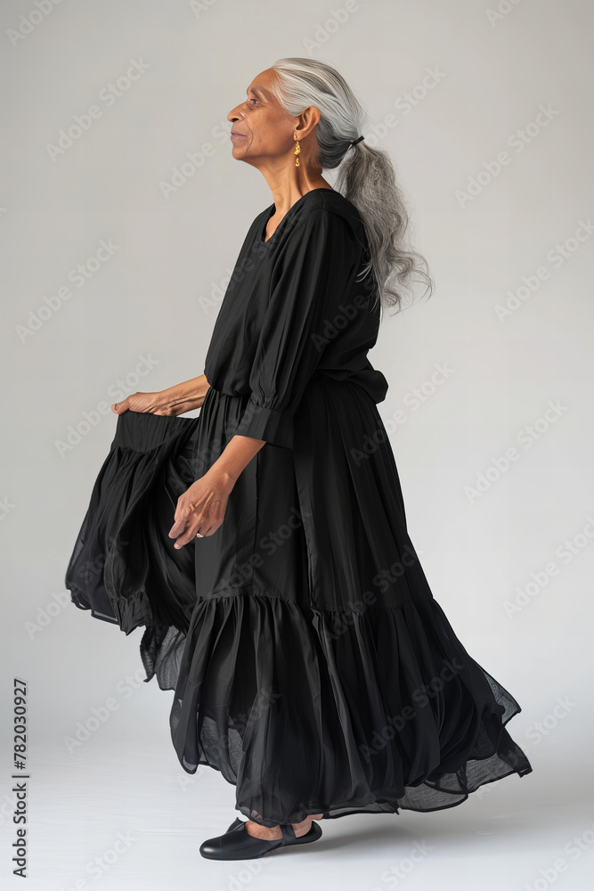 Elegance in Age: Timeless Beauty Gracefully Captured in Flowing Dress Banner