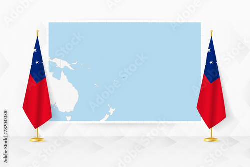 Map of Samoa and flags of Samoa on flag stand.