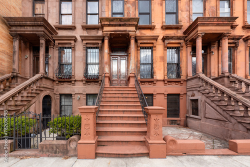 Harlem Brownstones with stoop steps in Harlem (Mount Morris Park Historic District). Row of Townhouses Manhattan, New York City