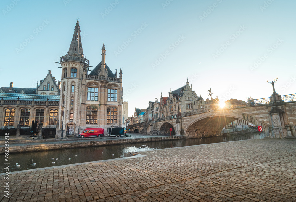 Obraz premium Ghent promenade called the Graslei and the charming historic houses at sunrise. The centre of the Belgian city. Flanders