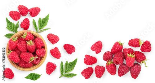 raspberries in wooden bowl with leaves isolated on white background with copy space for your text. Top view. Flat lay pattern