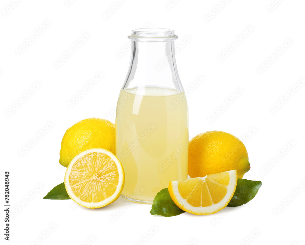 Obraz premium Refreshing lemon juice in bottle, leaves and fruits isolated on white