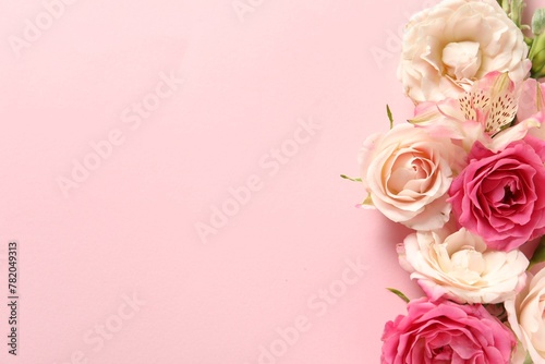 Happy Mother s Day. Beautiful roses on pink background  flat lay. Space for text