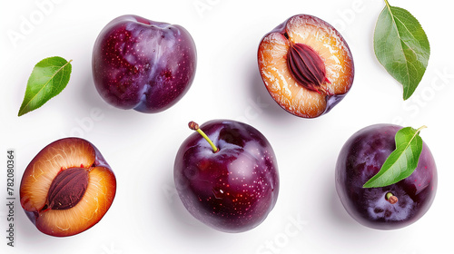 Top view of a set of fresh plums isolated on a white background, featuring a variety of whole and sliced plums that reveal the juicy interior and stone. This composition showcases the deep purple 