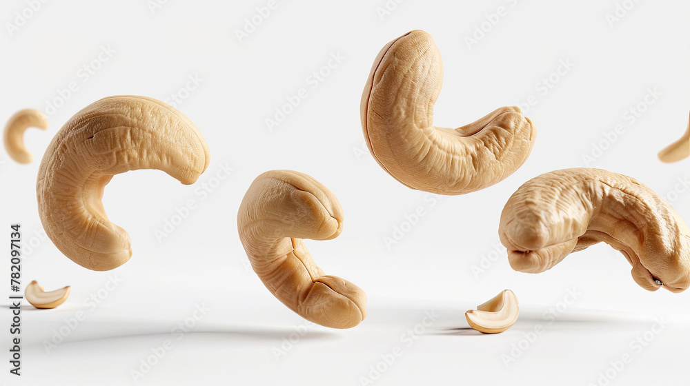 Floating cashew nuts isolated on white background Floating cashew nuts isolated on white background
