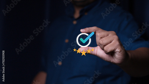Quality Assurance Concept. Business people show high quality assurance mark, good service, premium, five stars, premium service assurance, excellence service, high quality, business.