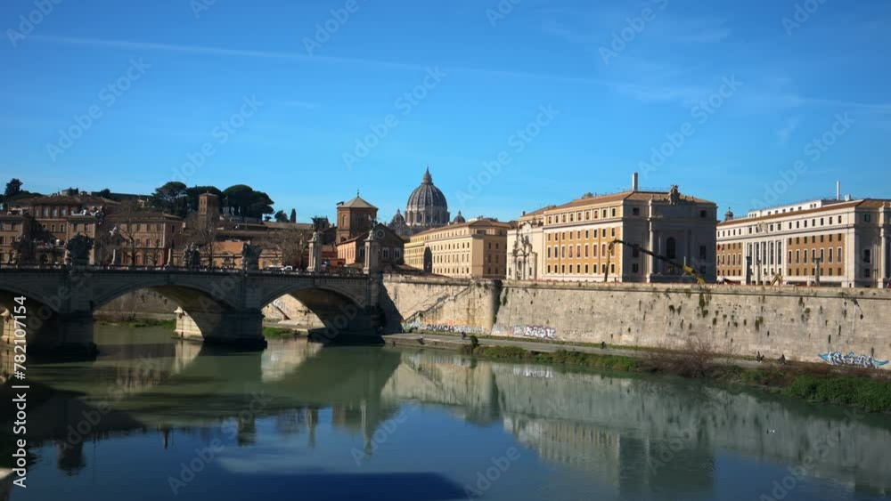 Ponte Sant'Angelo across River Tiber with city view on the background Ponte Sant'Angelo across River Tiber with city view on the background