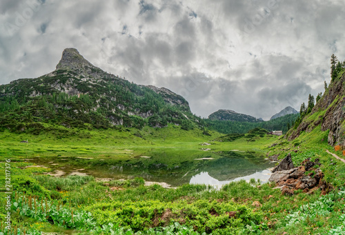 A walk though the Berchtesgaden mountain alps visiting the Kärlinger Haus and enjoy the green grass at the mountain valley while hiking