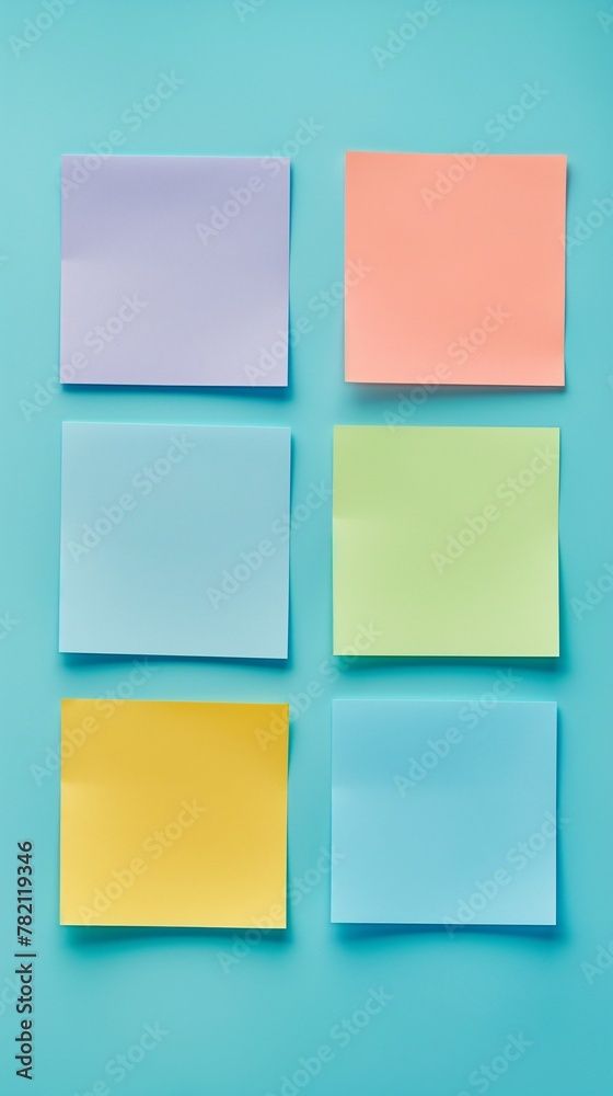 Pastel Memo Pads on Teal Surface