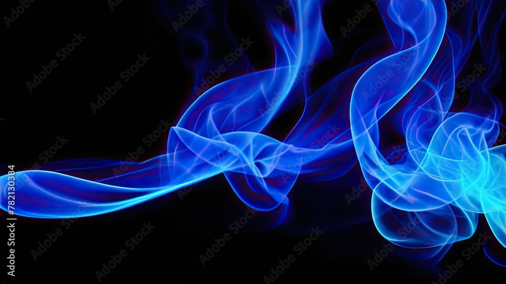 Beautiful blue smoke on a black background.