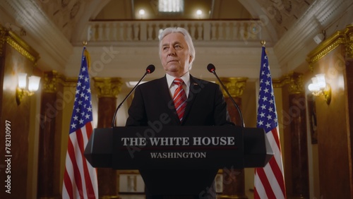 Tableau sur toile Senior republican politician answers press questions and gives interview for TV breaking news in White House